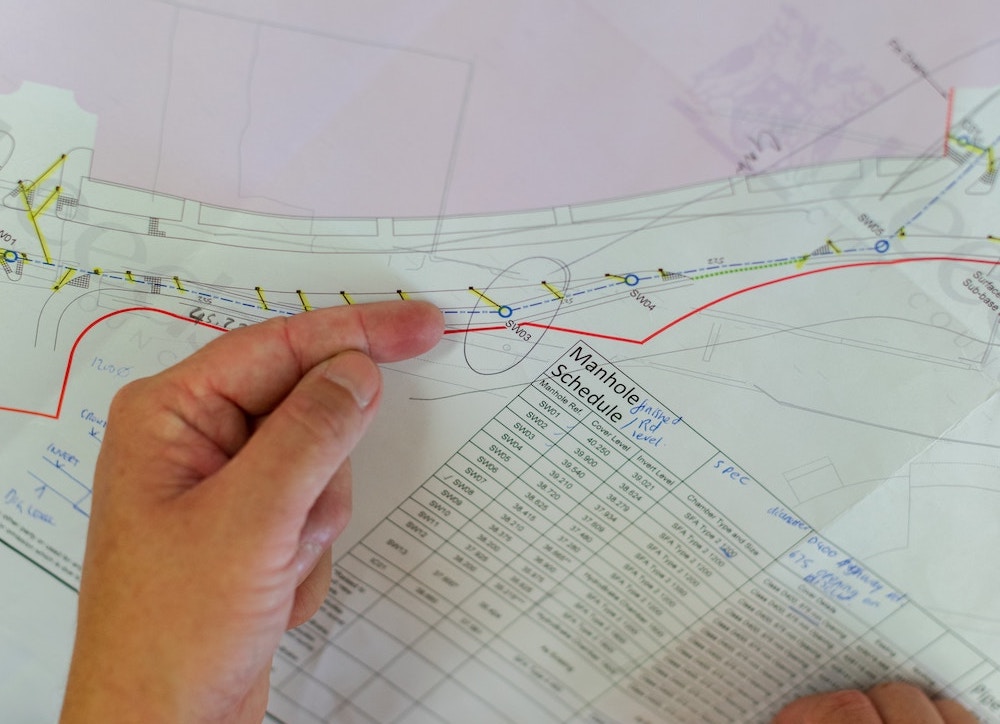 interacting with a printed out utility map