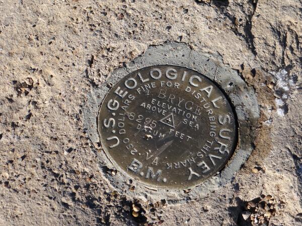 a USGS survey benchmark embedded in rock